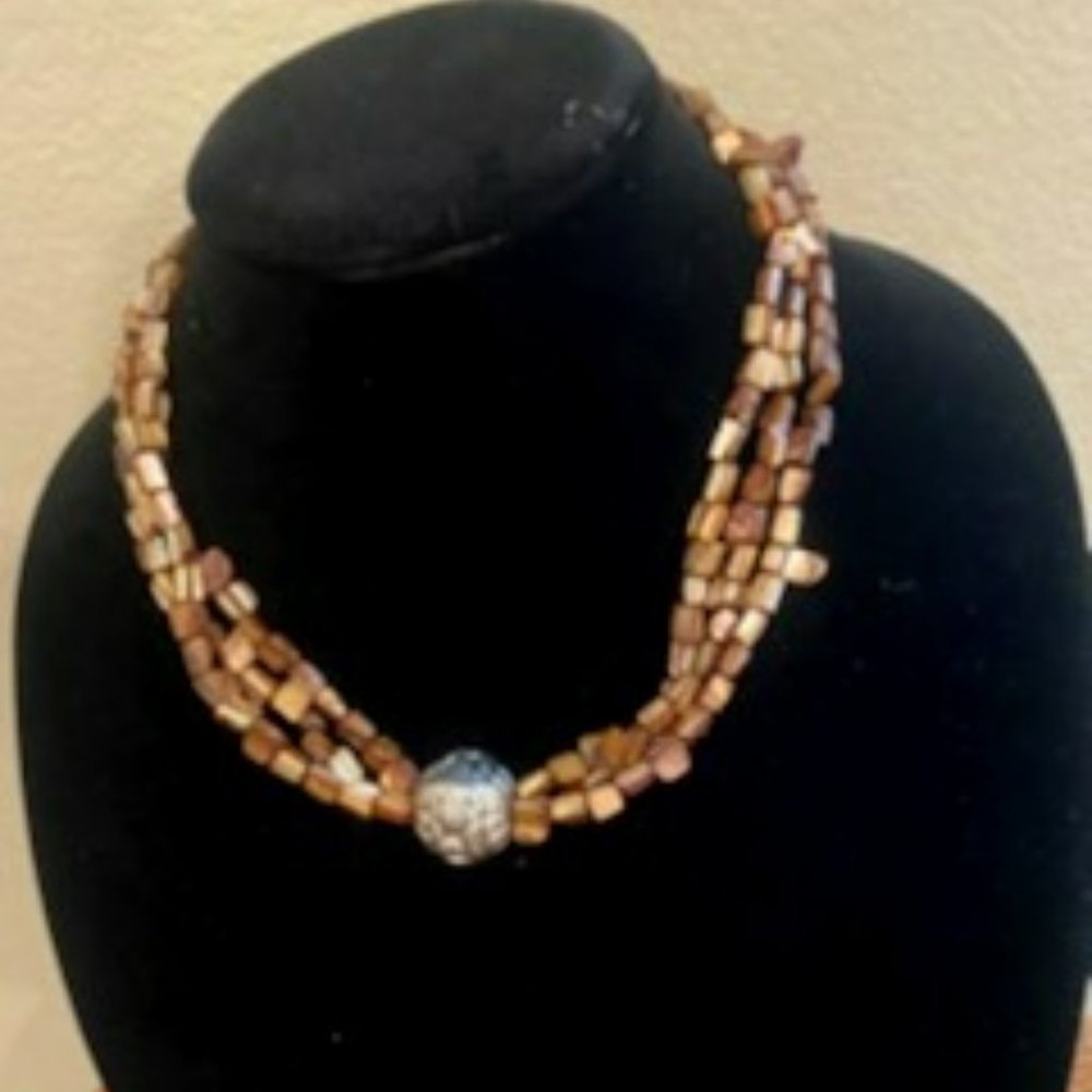 Brown/tan beads with silver drop